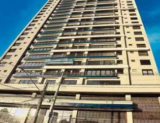 Fachada do Talk Marista em Goiânia, com torre residencial, varandas e acesso principal do edifício