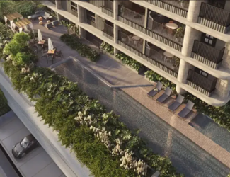 Vista aérea da área de lazer com piscina, deck e jardins do empreendimento Fascino Consciente.