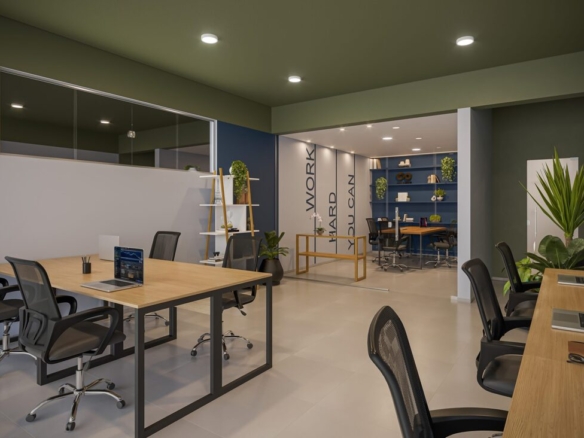 Espaço de coworking com mesas de madeira, cadeiras pretas ergonômicas e decoração inspiracional "Work Hard".