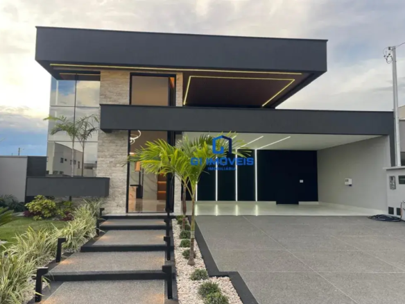 Fachada de casa moderna com design imponente, iluminação LED e paisagismo no Parqville Pinheiros.