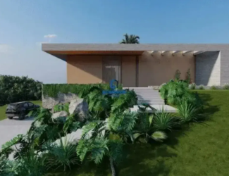 Fachada de casa térrea moderna com escadaria e jardim no Residencial Aldeia do Vale.