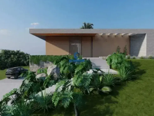 Fachada de casa térrea moderna com escadaria e jardim no Residencial Aldeia do Vale.