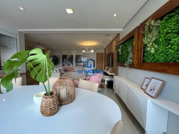 Sala de jantar e estar integradas com decoração moderna e teto rebaixado.