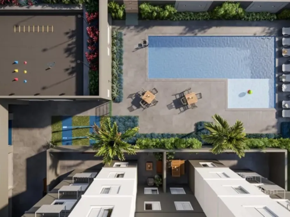 Área externa com paisagismo planejado e espaços de convivência no condomínio Now Praça C8, Setor sudoeste, Goiânia.