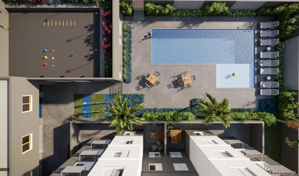 Área externa com paisagismo planejado e espaços de convivência no condomínio Now Praça C8, Setor sudoeste, Goiânia.