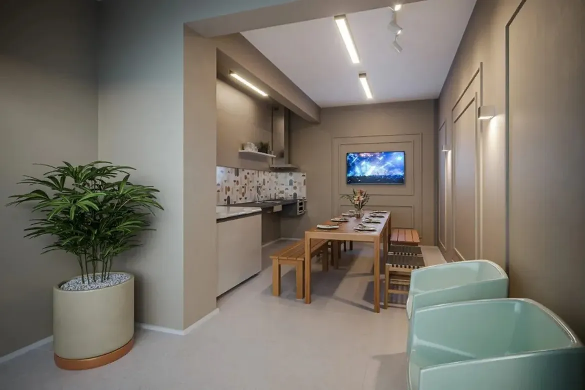 Espaço gourmet com churrasqueira a carvão e bancada de apoio no condomínio Now Praça C8.