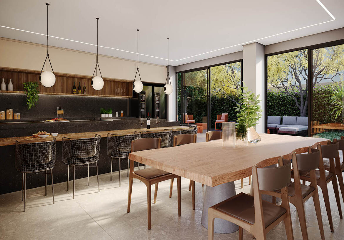 cozinha-compartilhada-design-moderno Cozinha compartilhada elegante com mesa de madeira maciça e iluminação pendente moderna.