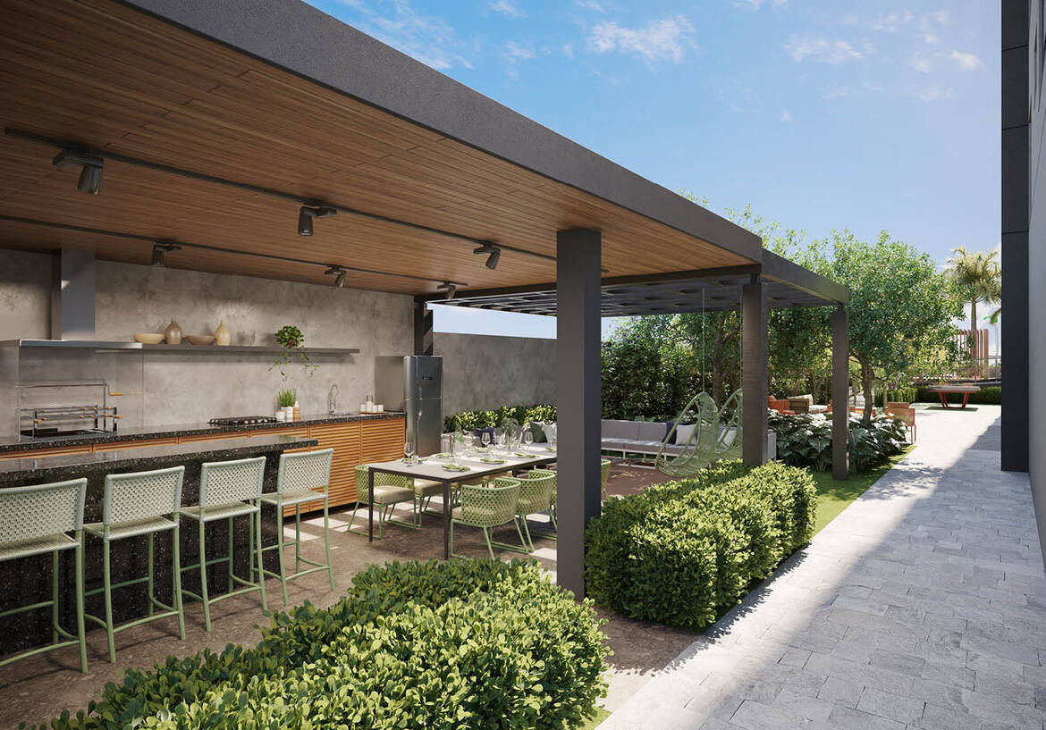 espaco-gourmet-externo-churrasqueira Espaço gourmet externo com churrasqueira, teto de madeira e bancada em granito escuro.