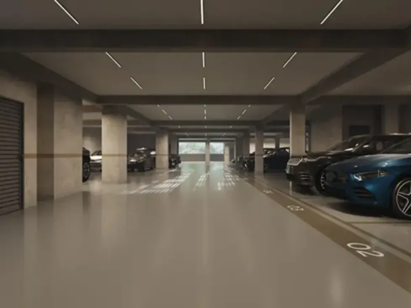 Garagem espaçosa e bem iluminada no subsolo do Fascino Consciente, com vagas demarcadas e seguras.