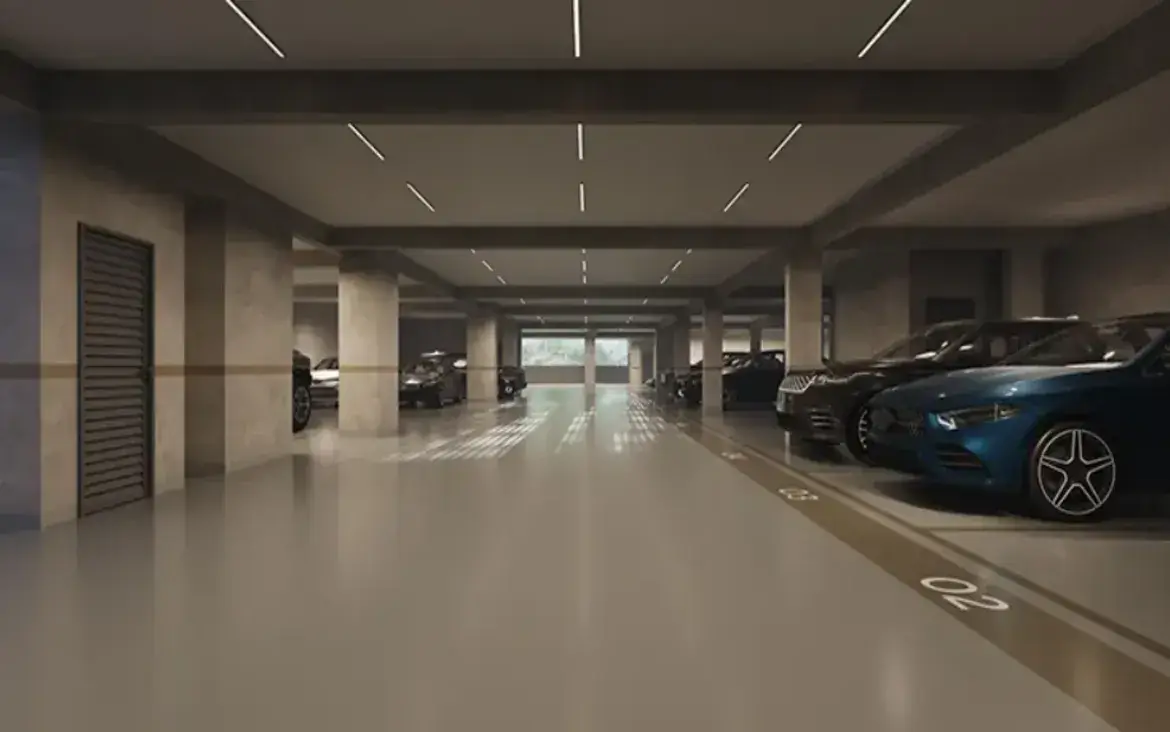 Garagem espaçosa e bem iluminada no subsolo do Fascino Consciente, com vagas demarcadas e seguras.