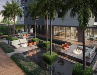 Área de lazer externa do Opus Tellure com lounges sobre espelho d'água e jardins.