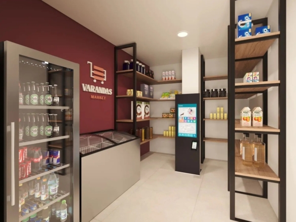 Mini mercado de conveniência autônomo dentro do condomínio com prateleiras e geladeiras abastecidas.