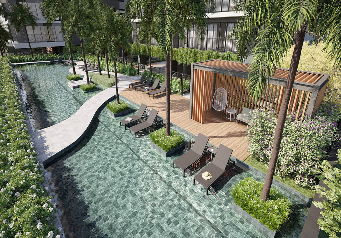 piscina-luxo-deck-madeira-bangalo Piscina com pastilhas verdes, deck de madeira, espreguiçadeiras e bangalô em meio ao paisagismo tropical.