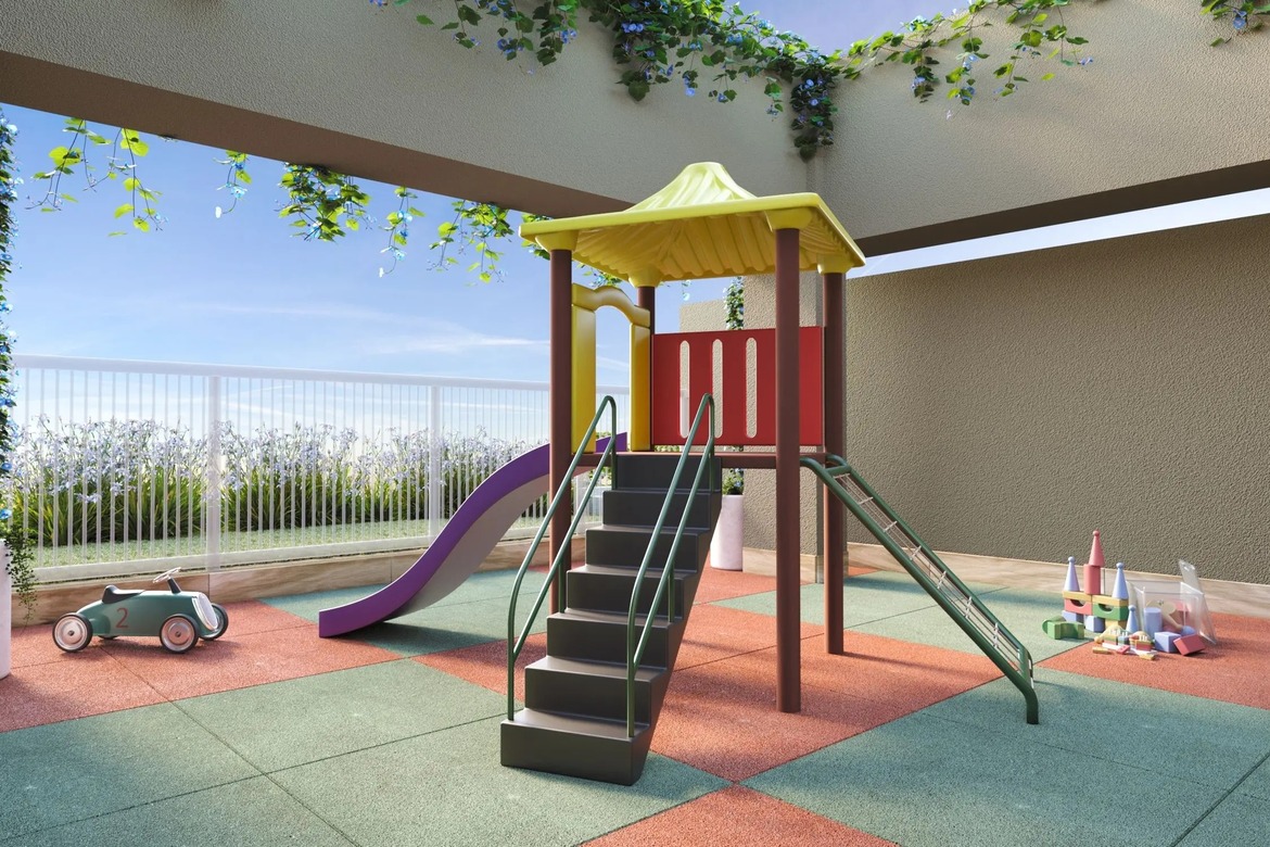 Playground colorido em área externa com escorregador e piso emborrachado para crianças.