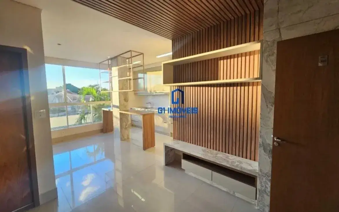 Sala de estar decorada com painel ripado neste apartamento no Parque Cascavel.