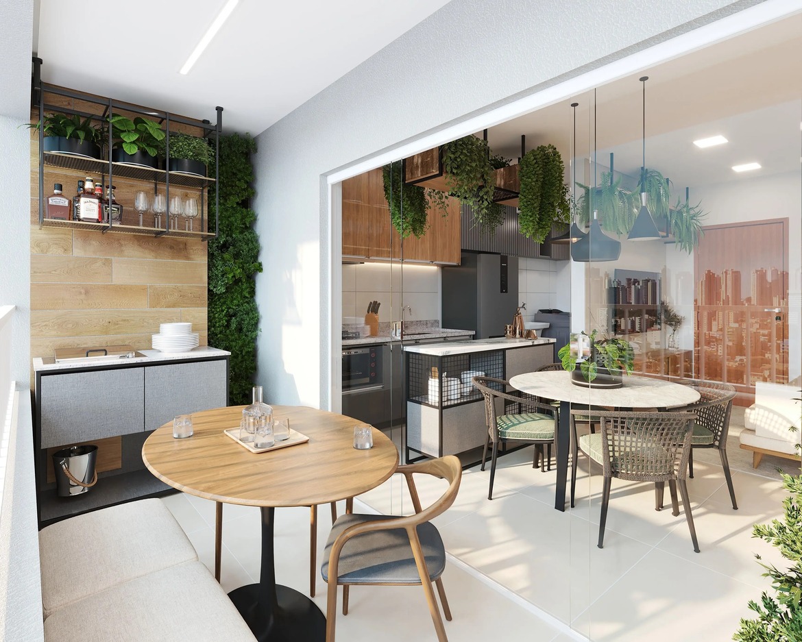 Varanda gourmet integrada com churrasqueira, mesa de jantar e jardim vertical no Varandas Flamboyant.