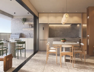 Varanda gourmet integrada com sala de jantar e cozinha moderna do empreendimento Fascino Consciente.