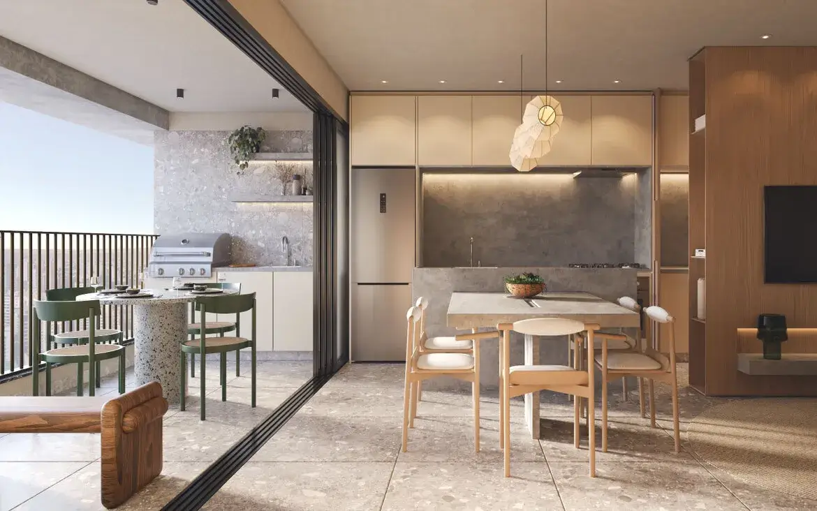 Varanda gourmet integrada com sala de jantar e cozinha moderna do empreendimento Fascino Consciente.