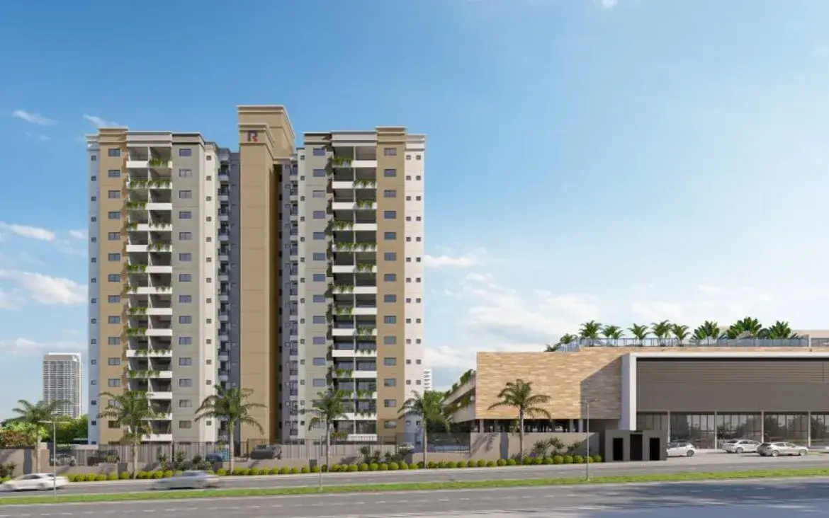 Vista frontal moderna das torres do condomínio Varandas Park com paisagismo na entrada.
