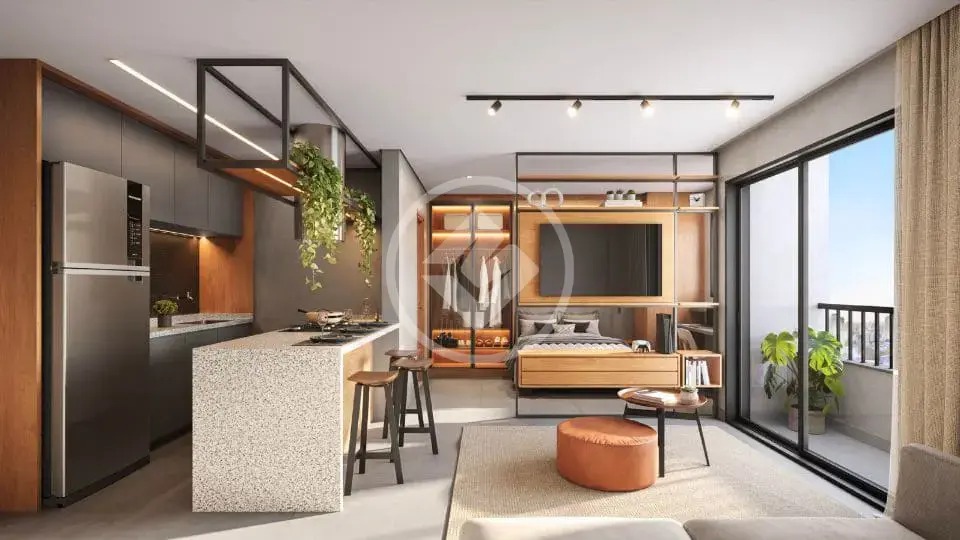 Interior de apartamento studio com cozinha integrada, sala e quarto em conceito aberto.