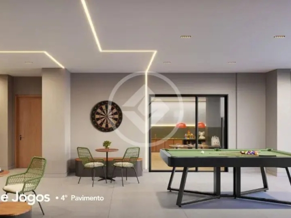 Lounge de jogos com mesa de sinuca, xadrez e alvo de dardos no Hello Viver Universitário.