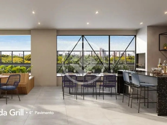Varanda grill com churrasqueira, bancada gourmet de granito e mesa de jantar.