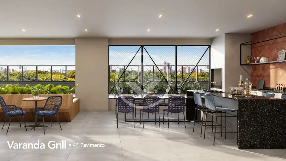 Varanda grill com churrasqueira, bancada gourmet de granito e mesa de jantar.