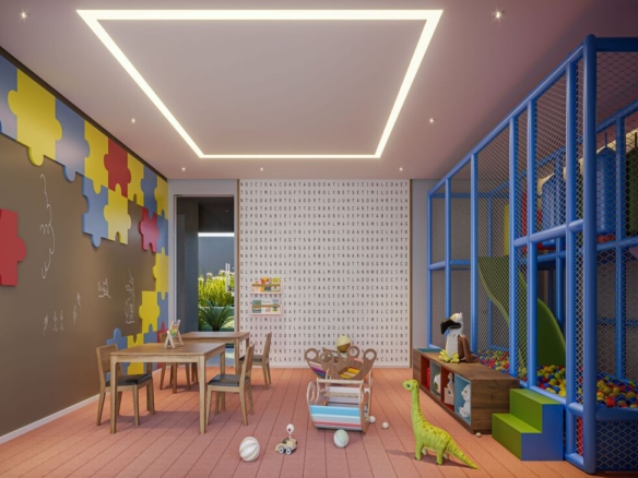 Brinquedoteca colorida com mesas de atividades, painéis lúdicos e piscina de bolinhas para crianças.