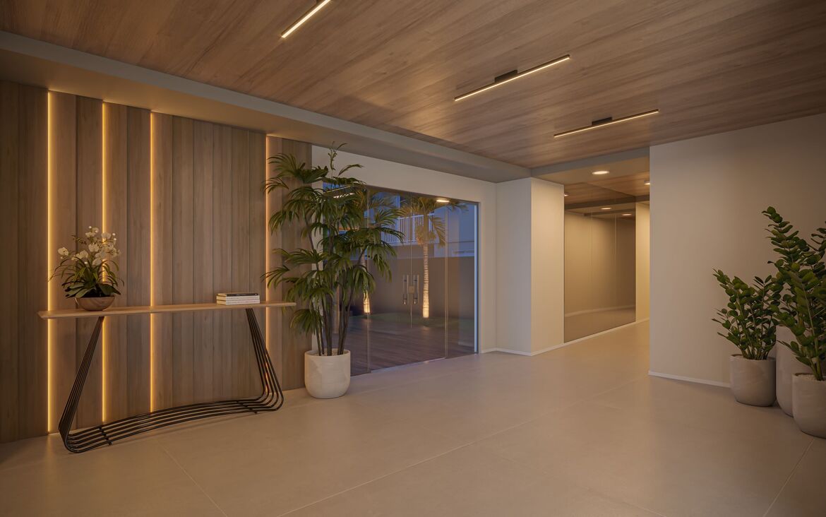 Lobby de entrada elegante para as torres A e B com recepção decorada e acabamento em madeira.