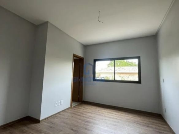 Quarto de solteiro com excelente ventilação natural e vista para a área verde do loteamento.