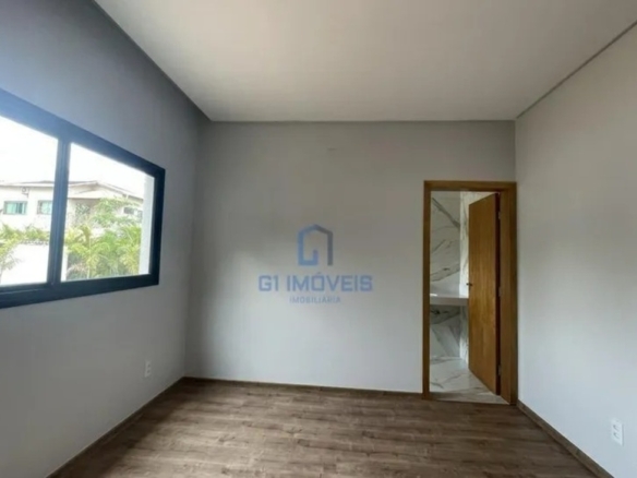 Ambiente íntimo com esquadrias de alumínio preto, garantindo vedação acústica e design moderno.