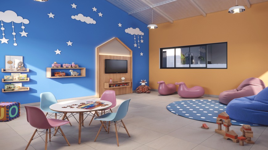 Espaço Kids colorido e decorado com mesas pequenas, pufes e brinquedos educativos no Viva Goiá.