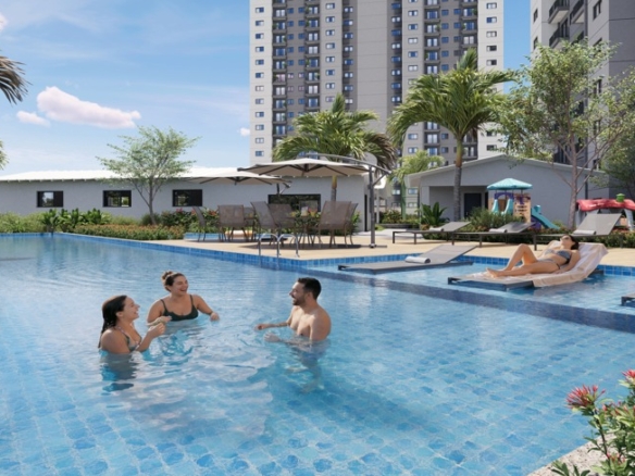 Piscina adulto e infantil com deck molhado e espreguiçadeiras na área de lazer do Viva Goiá.