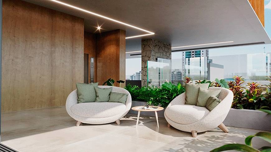 Sala de estar com sofá e mesa, além de iluminação embutida e revestimento claro