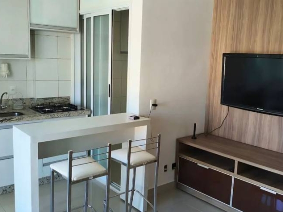 Sala de estar com televisão